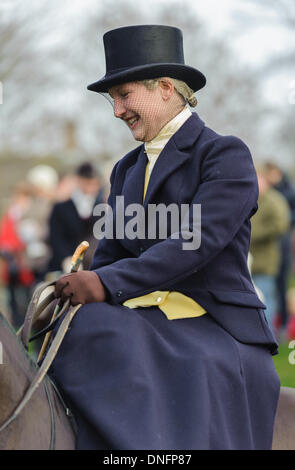 Oakham, Rutland, UK. 26th Dec, 2013. Side saddle rider Holly Campbell adds style to the Cottesmore Hunt's traditional Boxing Day meet. Credit:  Nico Morgan/Alamy Live News Stock Photo