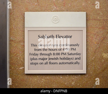 A sign for a Sabbath elevator in the lobby of New York Presbyterian Hospital on the upper East Side of Manhattan, NYC. Stock Photo