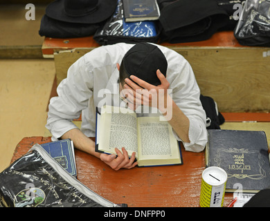 Lubavitch Hassidic student studying Talmud at their headquarters and synagogue at 770 Eastern Parkway in Brooklyn, New York. Stock Photo