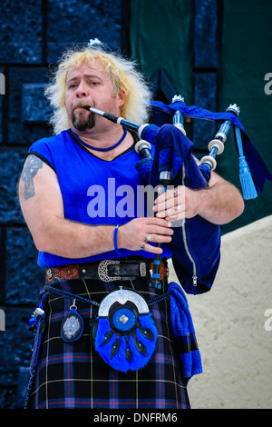 Scottish musician playing the bagpipes at a Sarasota Fair in Florida Stock Photo