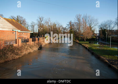 Tonbridge, Kent, UK. 26th Dec, 2013. Tonbridge, Kent has succumbed to the worst flooding since the 1960s.  Even a day after the water had begun to recede, the recreation ground and Sainsbury's car park still resembled a lake. Credit:  Scott Wishart/Alamy Live News Stock Photo