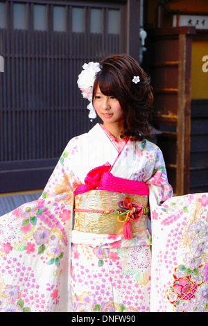KYOTO,JAPAN - OCTOBER 14:Young model poses for a photographer with kimono on October 14,2013 in Kyoto. Stock Photo