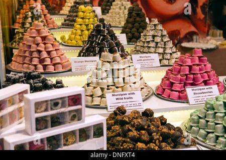 Many varieties of marzipans for sale at the Christmas Market in Winter Wonderland, Hyde Park, London, England Stock Photo