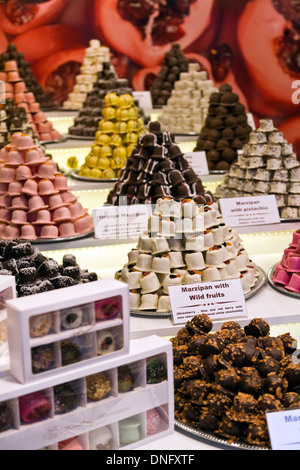 Many varieties of marzipans for sale at the Christmas Market in Winter Wonderland, Hyde Park, London, England Stock Photo