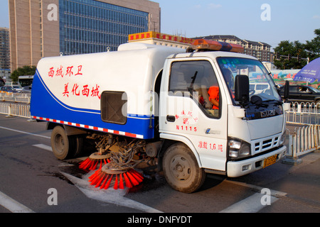 Beijing China,Chinese,Xicheng District,Guang An Men Nei Da Jie,Guanganmen Inner Street,sweeper,cleaning,China130918714 Stock Photo