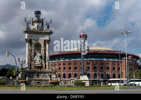 BARCELONA, SPAIN - SEPTEMBER 13, 2013: The Central Fountain designed by Josep Maria Jujol in the Placa Espanya with the Arenas Bullring Stock Photo