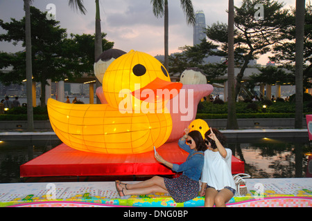 Hong Kong China,HK,Asia,Chinese,Oriental,Kowloon,Tsim Sha Tsui,Kowloon Public Pier,view,Victoria Harbour,harbor,public art artwork,sculpture,whimsical Stock Photo