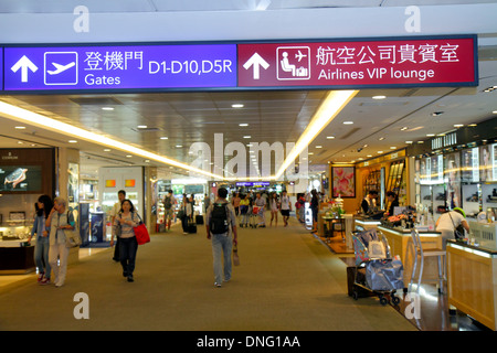 Republic of China,Taiwan,Taipei,Asia,Orient,Oriental,Taiwan Taoyuan International Airport,TPE,terminal,gate,sign,information,directions,Asian adult,ad Stock Photo