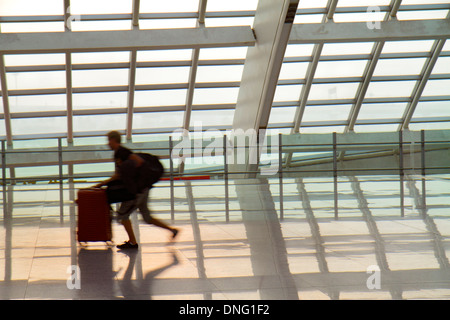 Beijing China,Chinese,Beijing Capital International Airport,PEK,Terminal 3,T3,Express Train Station,platform,man men male,interior inside,silhouette,s Stock Photo