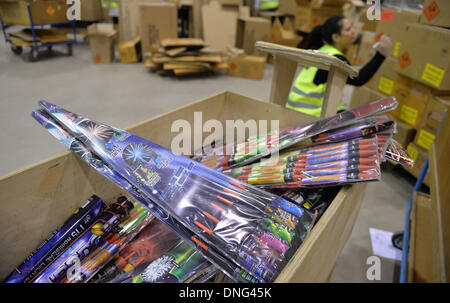 FILE - A file photo dated 03 December 2013 shows fireworks are packed into a box at COMET Fireworks in the company warehouse in Bremerhaven, Germany. For months, the company has been preparing for New Year's sales. Photo: Carmen Jaspersen Stock Photo