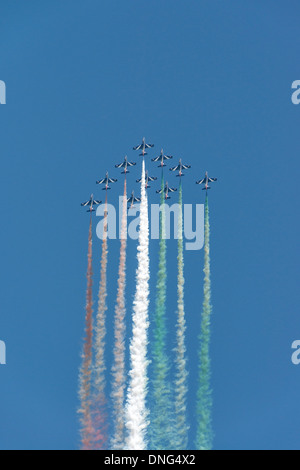 The Italian Aerobatic Display Team Il Frecce Tricolori perform a vertical climb crossover pass during their display at the RIAT Stock Photo