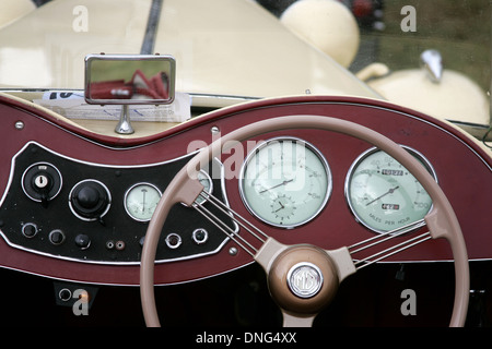 vintage car dashboard and steering wheel Stock Photo