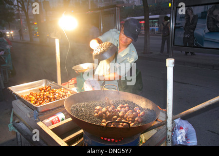 Beijing China,Chinese,Xicheng District,Guang An Men Nei Da Jie,Guanganmen Outer Street,Asian man men male,street,vendor vendors stall stalls booth mar Stock Photo