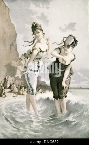 Two young ladies sea bathing in the 19th century. Stock Photo