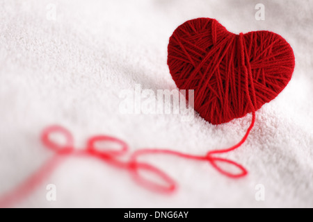 Yarn of wool in heart shape symbol Stock Photo