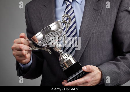 Winning business trophy Stock Photo