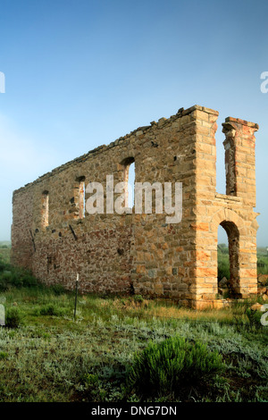 Ruined walls of Mutz Hotel, Elizabethtown ghost town (circa 1870s), New Mexico USA Stock Photo