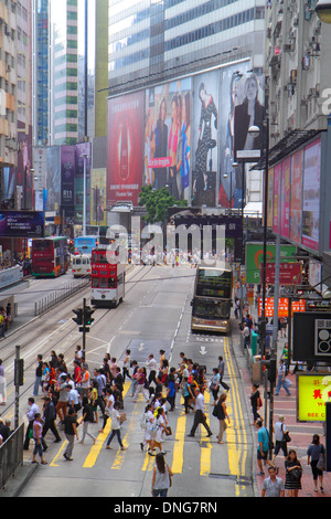 Hong Kong China,HK,Asia,Chinese,Oriental,Island,Causeway Bay,Yee Wo Street,crossing,bus,coach,billboards,ad,advertising,ads,businesses,district,double Stock Photo