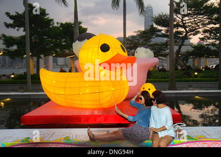 Hong Kong China,HK,Asia,Chinese,Oriental,Kowloon,Tsim Sha Tsui,Kowloon Public Pier,view,Victoria Harbour,harbor,public art artwork,sculpture,whimsical Stock Photo