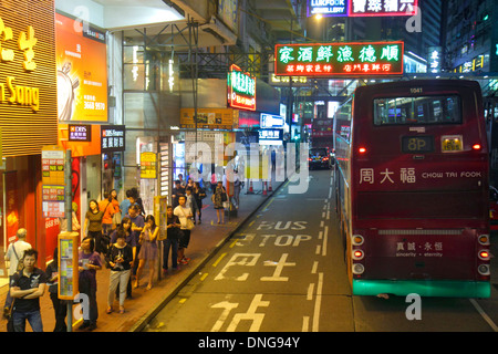 Hong Kong China,HK,Asia,Chinese,Oriental,Island,Causeway Bay,Hennessy Road,neon signs,businesses,district,shopping shopper shoppers shop shops market Stock Photo