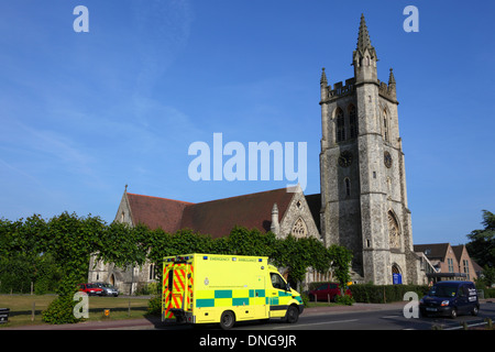 South East Coast Ambulance passing St Johns church , Royal Tunbridge Wells , Kent , England Stock Photo