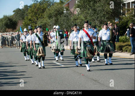 McGuires Pipe Band members parade on Veterans Day in Pensacola USA Stock Photo