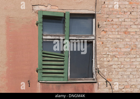 An old house with broken window shutters, Saxony, Germany, Europe Stock Photo