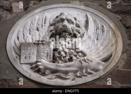 bas-relief of winged lion with the book and Pax tibi Marce, evangelista meus inscription, Venice, Italy Stock Photo