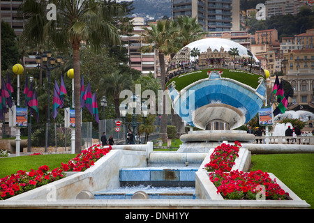 Sky Mirror sculpture with the Monte Carlo casino reflected in it and the houses for Monaco in the background Stock Photo