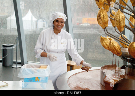 A Lindt chocolate employee, the Lindt Museum of Chocolate, Cologne ( Koln ), Germany, Europe Stock Photo