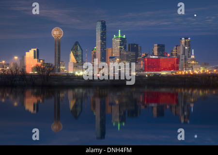 The Dallas skyline is reflected in an overflowing Trinity River in this Dallas, Texas, image. Stock Photo