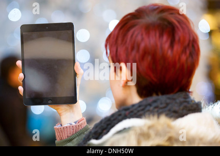 A girl holds an iPad. Stock Photo
