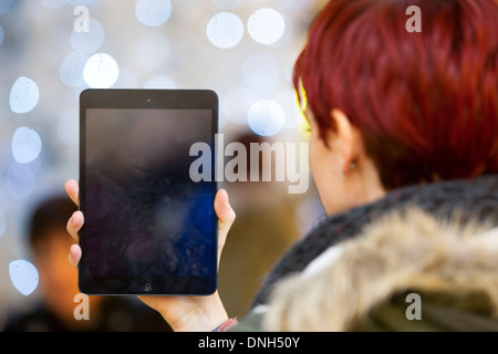 A girl holds an iPad. Stock Photo