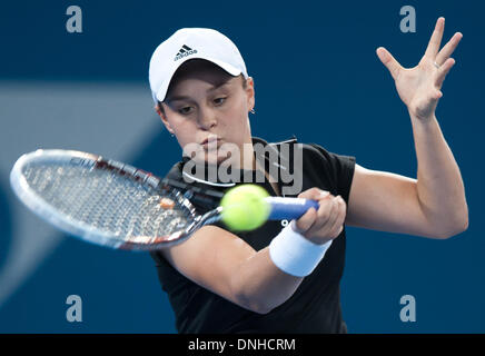 Brisbane, Australia. 30th Dec, 2013. Ashleigh Barty of Australia hits a return during her women's singles first round match against Daniela Hantuchova of Slovakia at Brisbane International tennis tournament in Brisbane, Australia, Dec. 30, 2013. Ashleigh Barty won 2-0. Credit:  Bai Xue/Xinhua/Alamy Live News Stock Photo