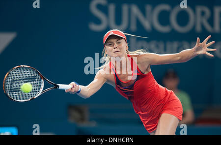 Brisbane, Australia. 30th Dec, 2013. Daniela Hantuchova of Slovakia hits a return during her women's singles first round match against Ashleigh Barty of Australia at Brisbane International tennis tournament in Brisbane, Australia, Dec. 30, 2013. Hantuchova lost 0-2. Credit:  Bai Xue/Xinhua/Alamy Live News Stock Photo