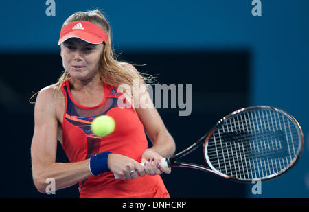 Brisbane, Australia. 30th Dec, 2013. Daniela Hantuchova of Slovakia hits a return during her women's singles first round match against Ashleigh Barty of Australia at Brisbane International tennis tournament in Brisbane, Australia, Dec. 30, 2013. Hantuchova lost 0-2. Credit:  Bai Xue/Xinhua/Alamy Live News Stock Photo