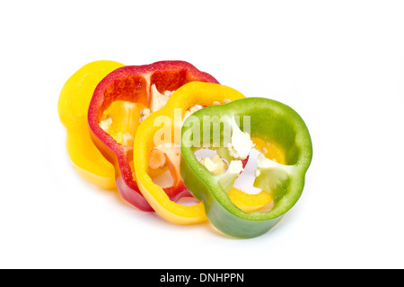 Sliced Of Colorful Sweet Peppers Isolated On White Background. Stock Photo