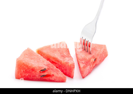 Pieces of Watermelon With Fork Isolated On White Background. Stock Photo