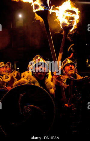 Edinburgh, Scotland, UK. 30th December 2013, Start of Edinburgh's Hogmanay celebrations with Vikings from the torchlight Procession and fireworks on Calton Hill from the Son et lumiere finale of the procession, Scotland UK Credit:  Arch White/Alamy Live News Stock Photo