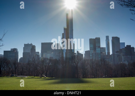 The 90 story luxury tower One57 casts a shadow over Central Park Stock Photo