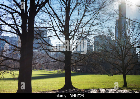 The 90 story luxury tower One57 casts a shadow over Central Park Stock Photo