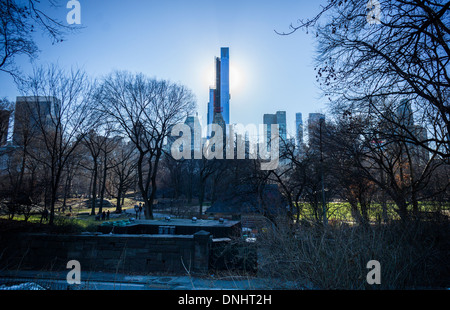 The 90 story luxury tower One57 casts a shadow over Central Park Stock Photo