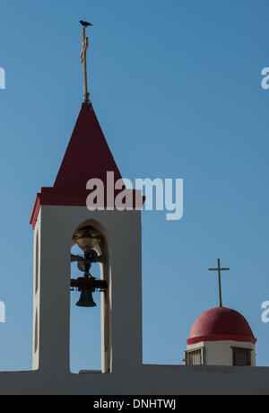 (131231) -- ACRE, Dec. 31, 2013 (Xinhua) -- A bird stands on top of St. John's Church in the Old City of Acre, northern Israel, on Dec. 27, 2013. The Old City of Acre in Acre in Israel was inscribed on the UNESCO World Heritage List in 2001. With a history of more than 5,000 years recorded in documents, Acre is a walled port-city with continuous settlement from the Phoenician period. The present city is characteristic of a fortified town of the Ottoman dating from 18th and 19th centuries, with typical urban components such as the citadel, mosques, khans and baths. The remains of the Crusader t Stock Photo