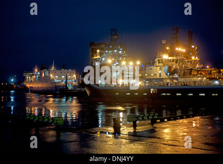 Ferries and Oil supply boats light up the docks at Aberdeen harbour.  SCO 9170 Stock Photo