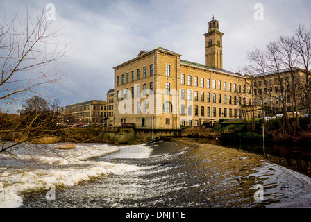 New Mill, Saltaire, West Yorkshire. River Aire in foreground. Stock Photo