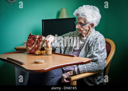 RETIREMENT HOME ILLUSTRATION, ELDERLY PERSON HAVING A SNACK Stock Photo