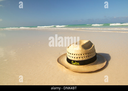 Straw Hat on Cuban beach Stock Photo