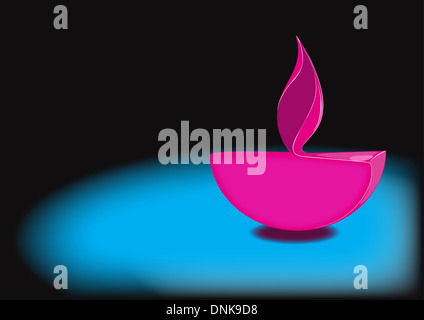 Diwali oil lamp isolated on blue background Stock Photo