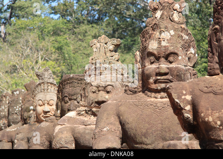 Heads on Bridge Angkor Thom, Cambodia Stock Photo