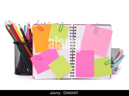 Blank checked notebook with notice papers isolated on white background cutout Stock Photo